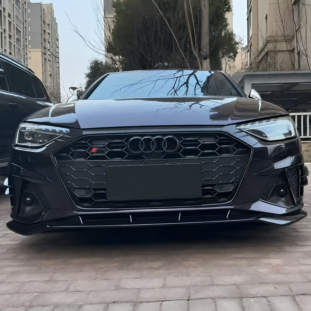 Audi A4 S4 B9 facelift fitted with gloss black three-piece front splitter