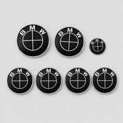 Seven-piece full black replacement emblem set compatible with BMW