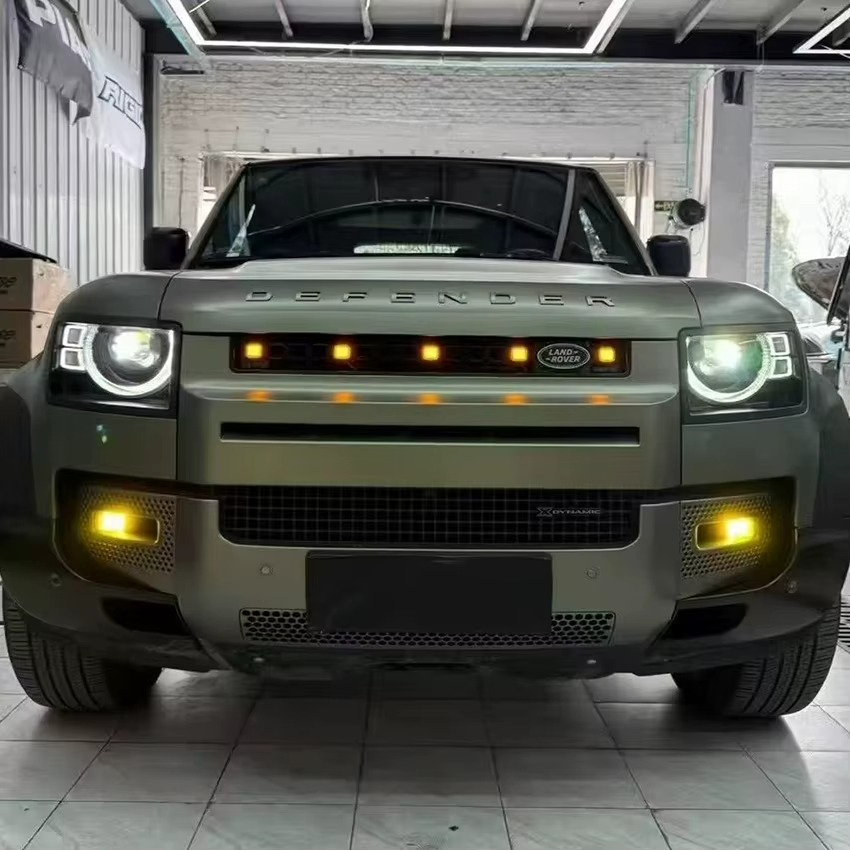 Amber square LED front grille fitted to a Defender