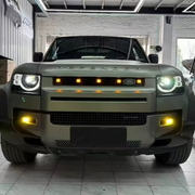 Amber square LED front grille fitted to a Defender
