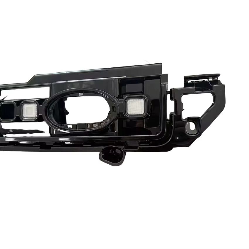 Centre badge opening detail on square LED front grille