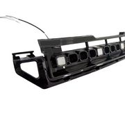 Left side detail of gloss black square LED front grille