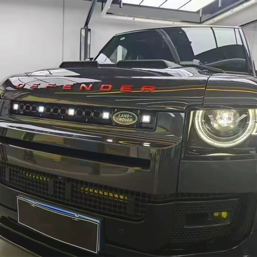 White square LED front grille fitted to a Defender