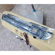 Illuminated front grille packaged for delivery