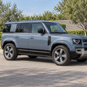 Illustrative gloss-black lower door trim fitted to Defender 110 L663
