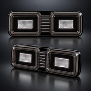 Pair of smoked black rear bumper LED lamp modules for Defender