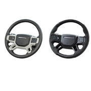 Land Rover Defender steering wheel before and after upgrade