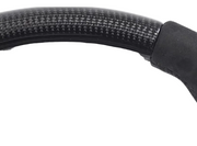 Close-up of steering wheel carbon fibre section