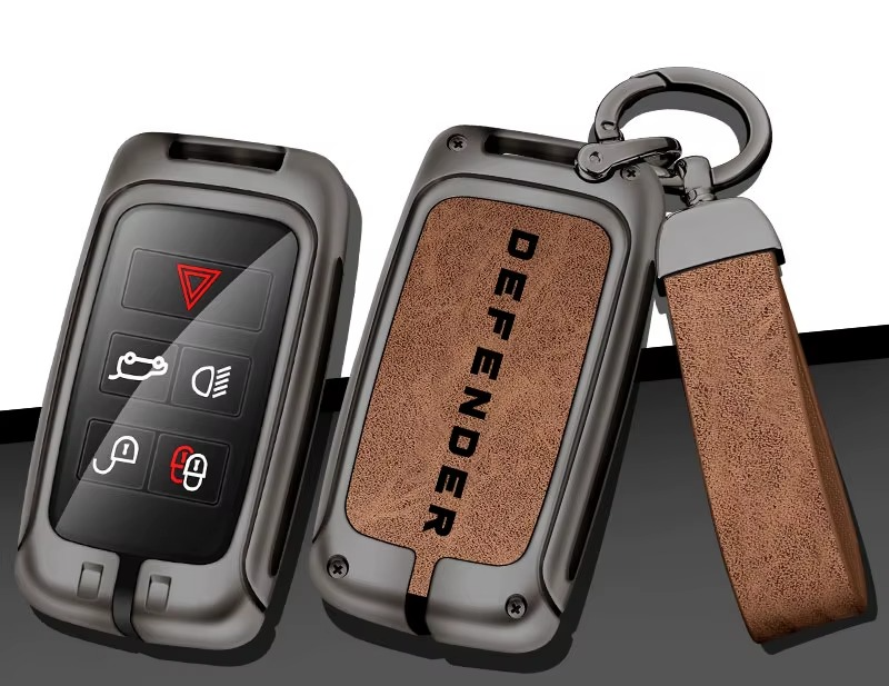 Defender compatible zinc alloy key case with brown insert and strap