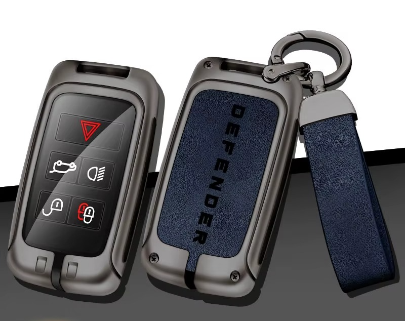 Defender compatible zinc alloy key case with navy insert and strap