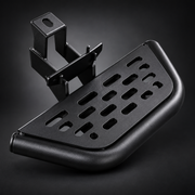 Close-up of perforated powder-coated carbon steel mini side step and mounting bracket
