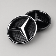 Chrome three-point star grille emblem detail