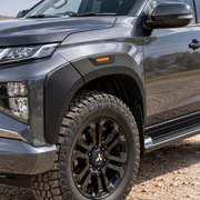 Close-up of Mitsubishi L200 2019 to 2023 matte black 55mm front fender flare