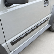Angled view of black lower door protector trim on Suzuki Jimny 3 door